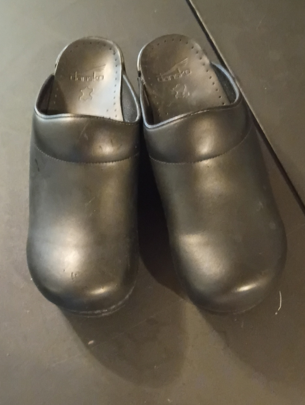 Dansko Black Leather Slip-On Clogs